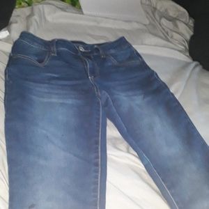 Dark washed blue jeans
